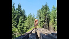 Edward on a naked walk over a bridge Thumb